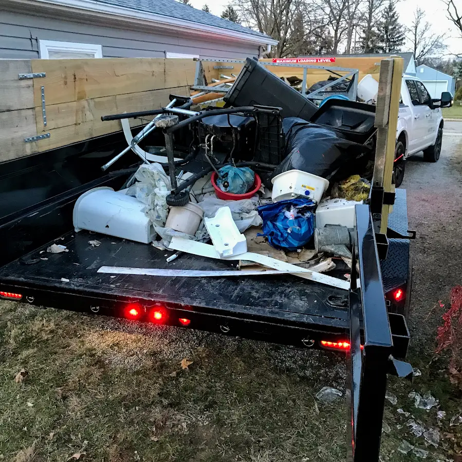 Roll-off dumpster delivered to a residential driveway in Cato